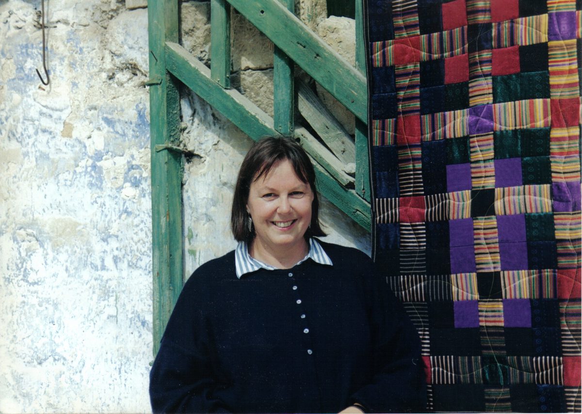 Woman and quilt