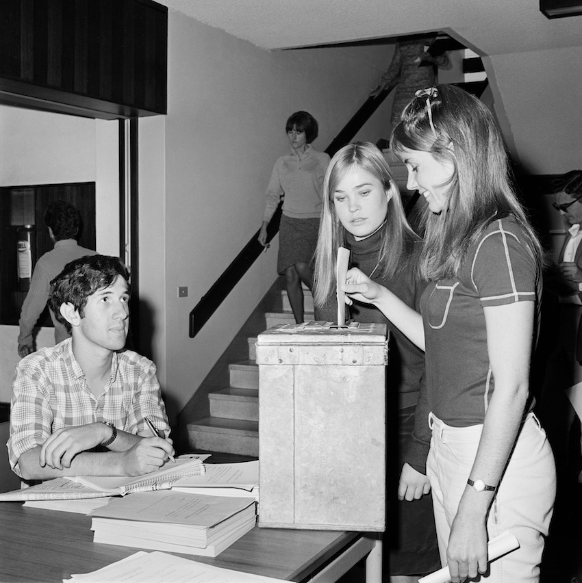 Young women voting