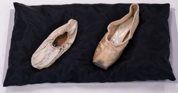 Autographed ballet shoes in filing cabinet pointe to our greatest dancers