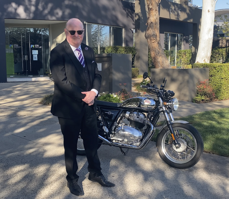 John Aust by his classic bike for the The Distinguished Gentleman's Ride