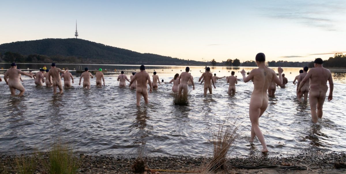 Naked swimmers take the plunge.