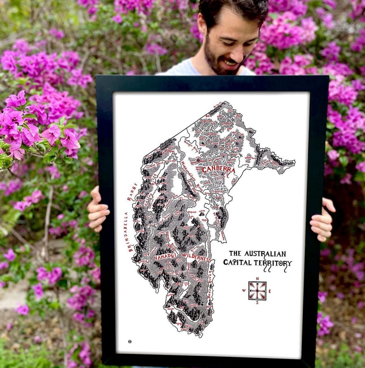 Man holding map in a frame