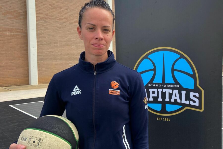 Kristen Veal holding a basketball