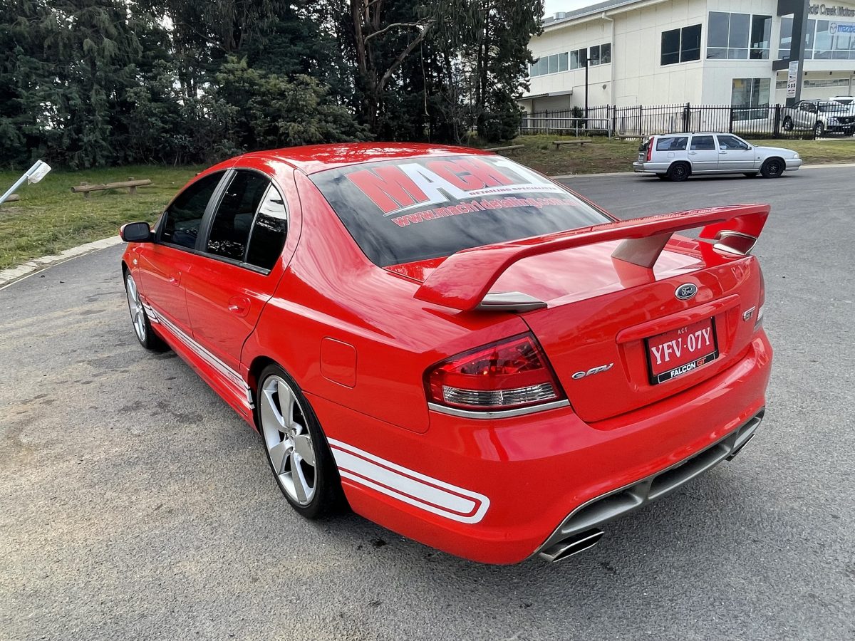 detailing on a red Ford Falcon