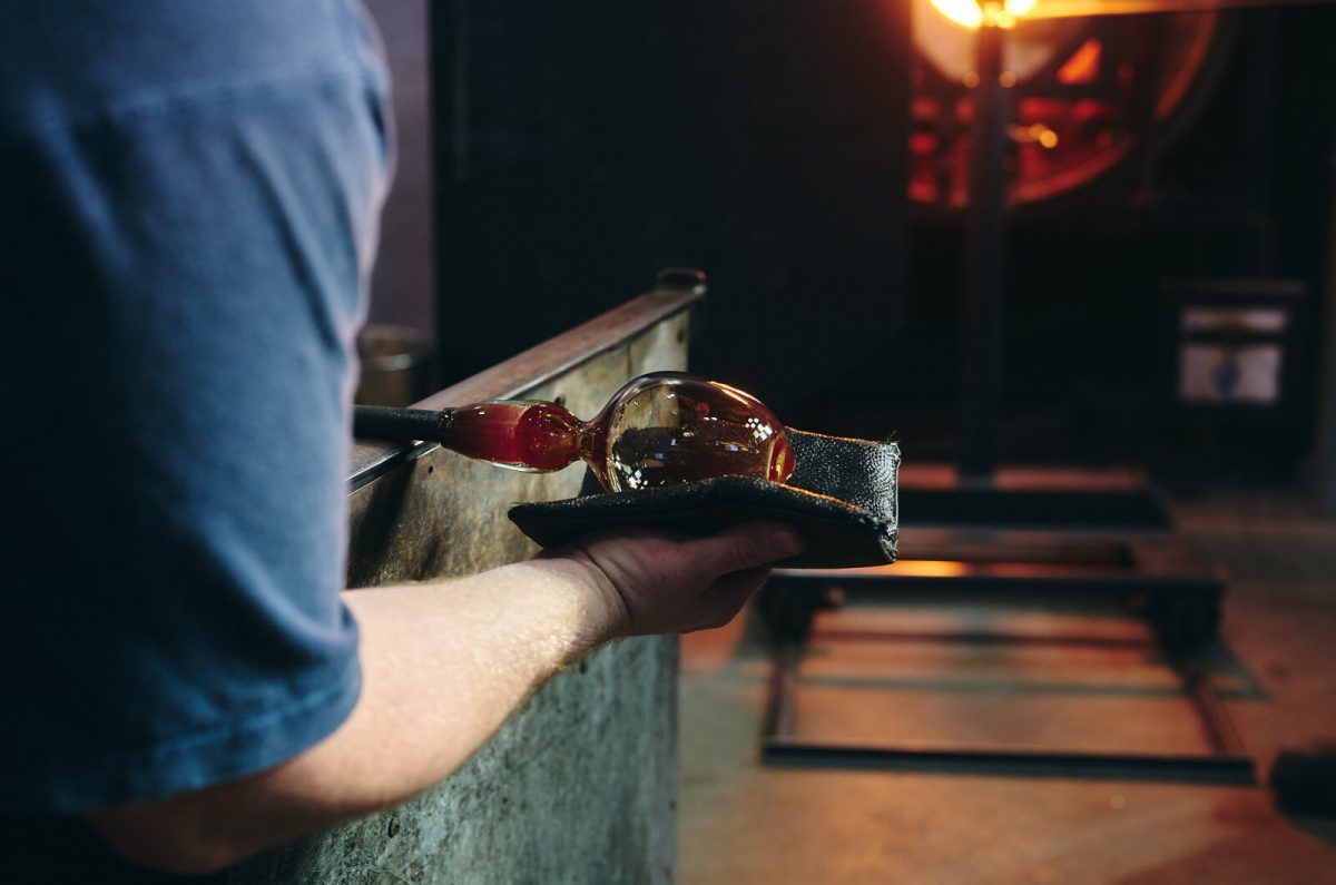 Person making glass