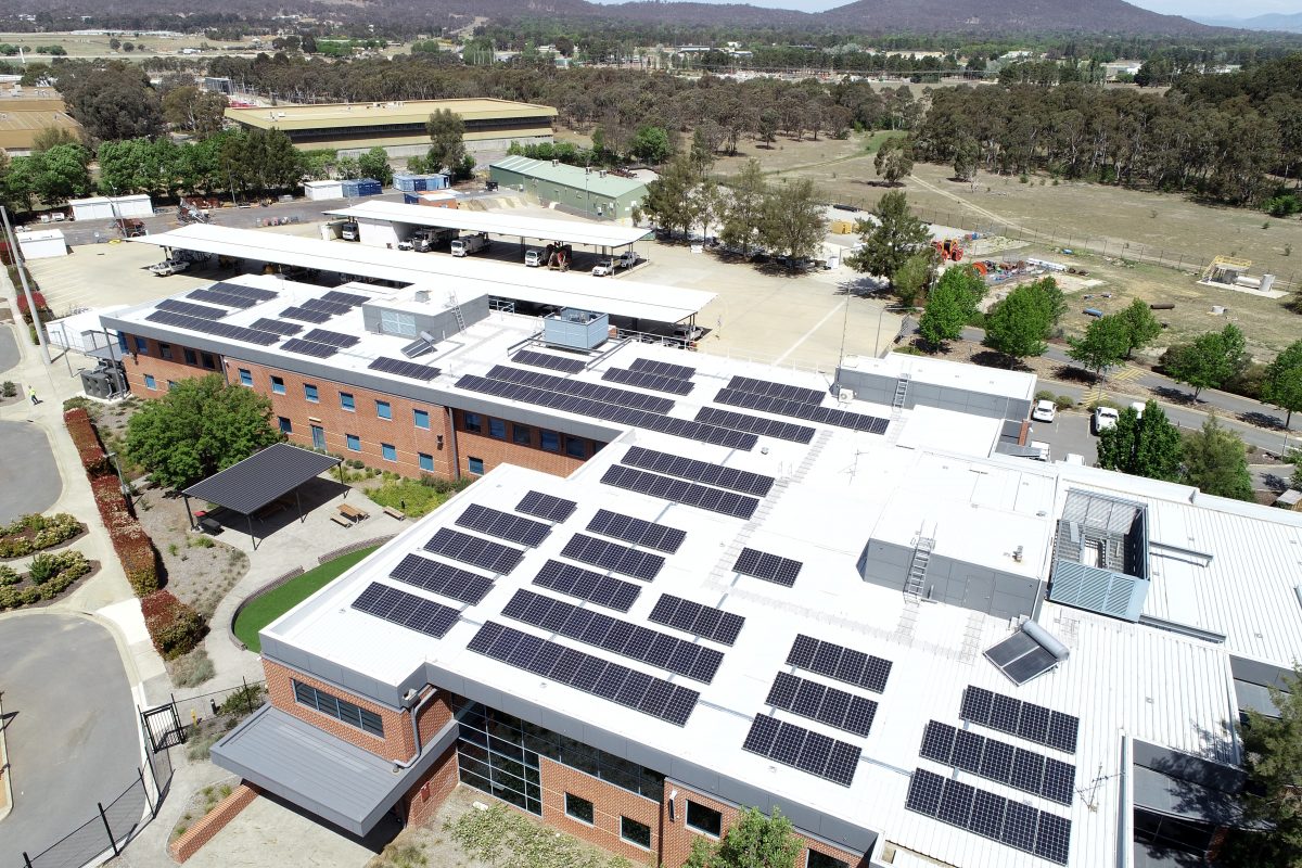 aerial view of building with solar panels