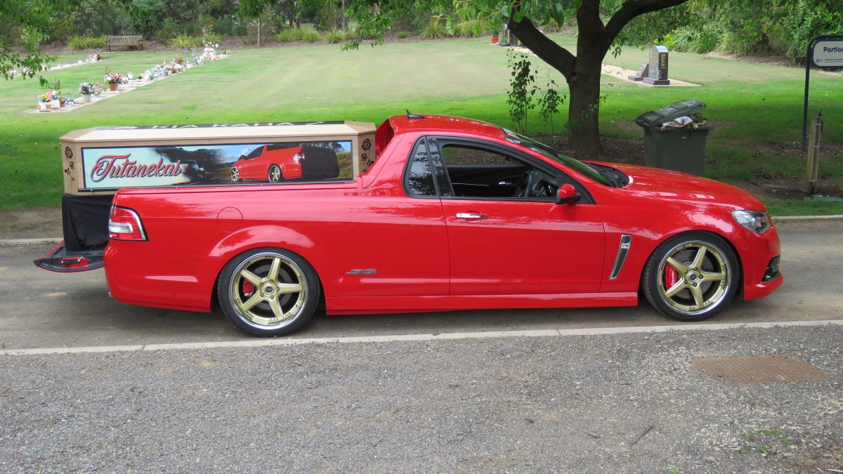 Red ute with coffin