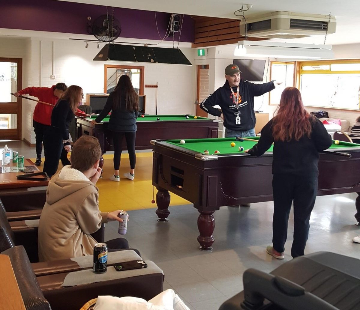 people playing pool