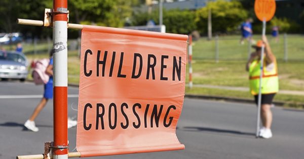 Police search for driver who hit child's bike on crossing