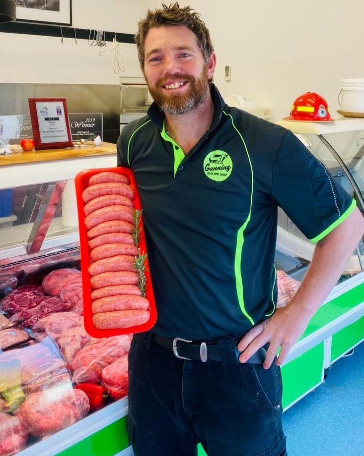 Butcher with sausages