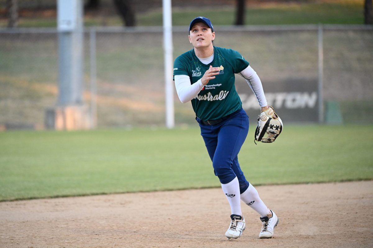 Softball player Clare Warwick in action