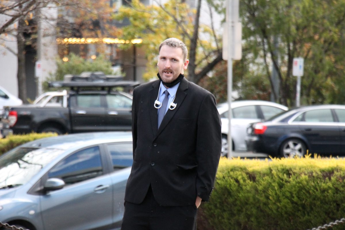 Man in suit outside court