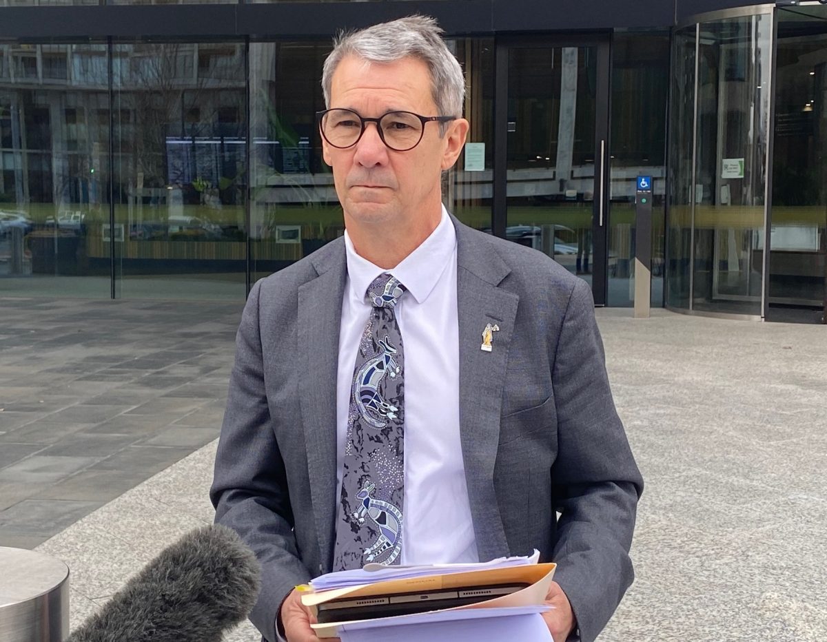 Man standing outside court