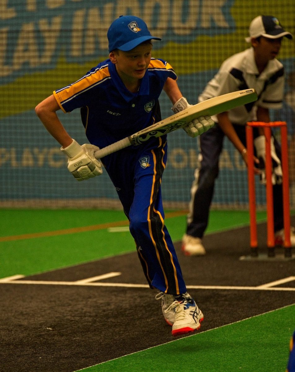 Cricketer running between wickets