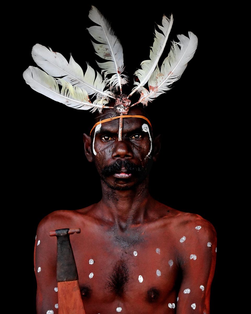 First Nations man in headdress