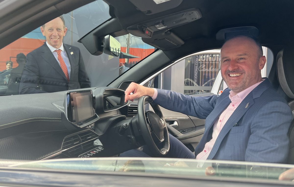 Shane Rattenbury and Andrew Barr in an electric car