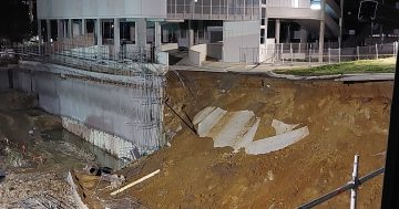 Wall collapse causes carpark evacuation in Phillip