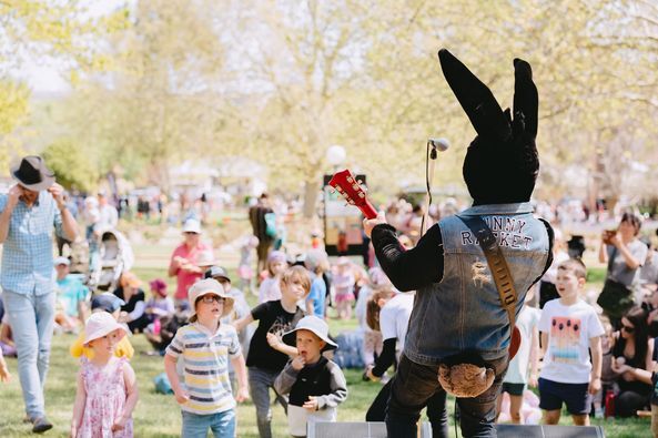 Shot of entertainer dressed as a bunny and entertaining children on stage