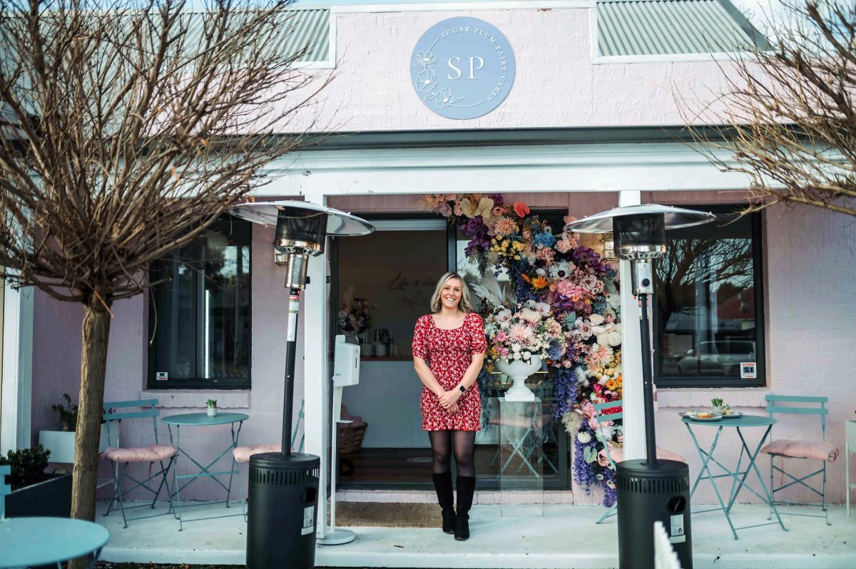 Woman outside shop