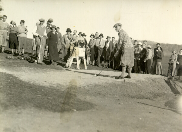 Man playing golf in 1933