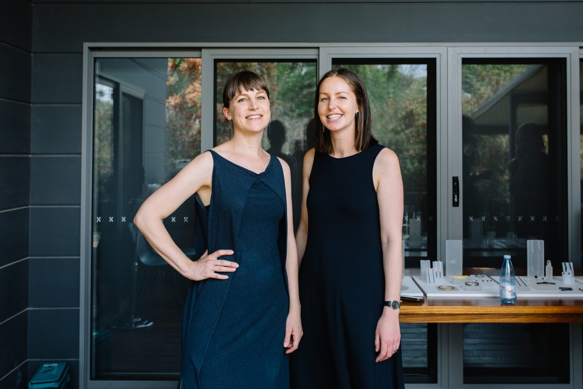 two women standing