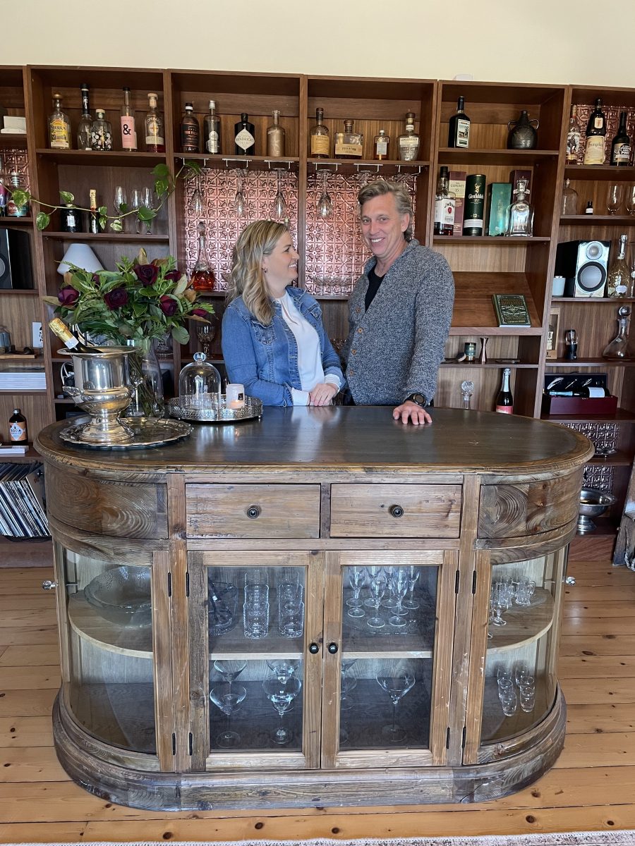 Couple in a bar in their home