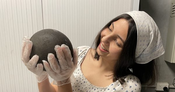 The story behind the cannonball found in the Canberra office cupboard