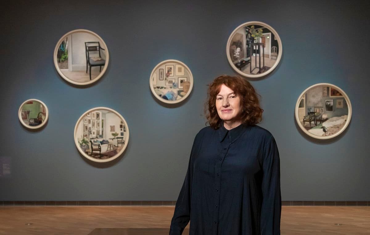 woman standing in art gallery