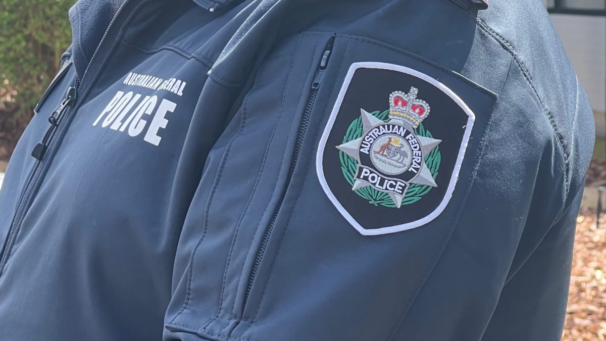 close up of AFP logo on ACT Policing officer's uniform