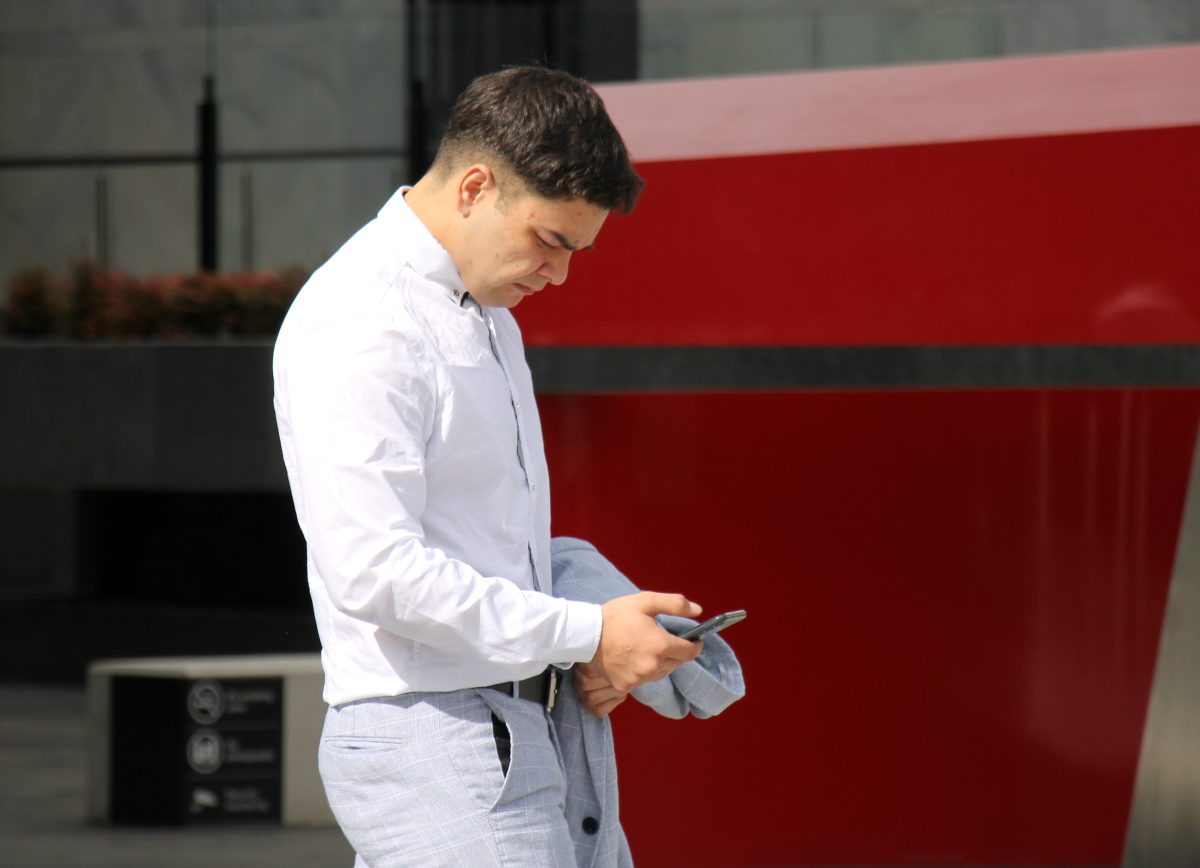 Man looking at his mobile phone