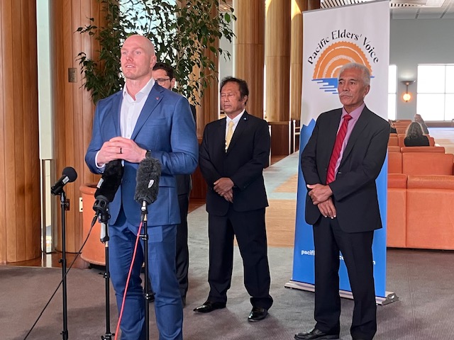 Four men speaking to media at Parliament House