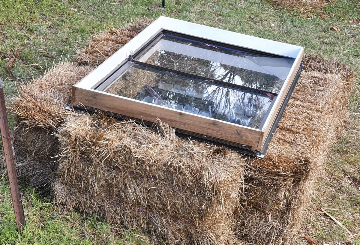 hay bales and glass pane. 