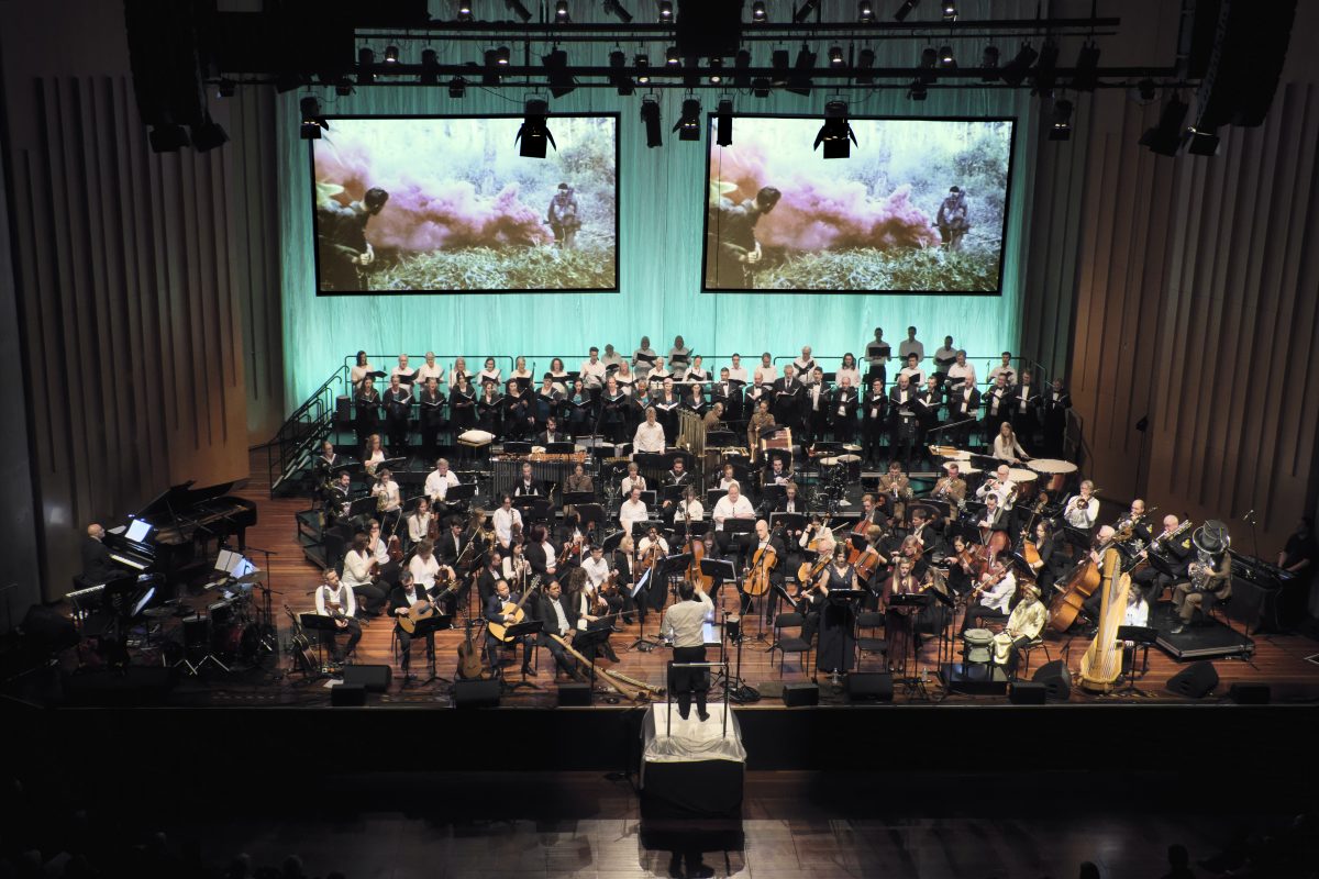 Conductor conducting an orchestra at Llewellyn Hall