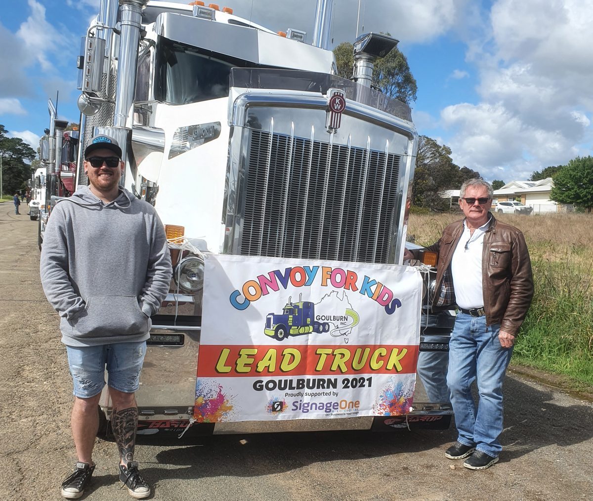 two men and truck