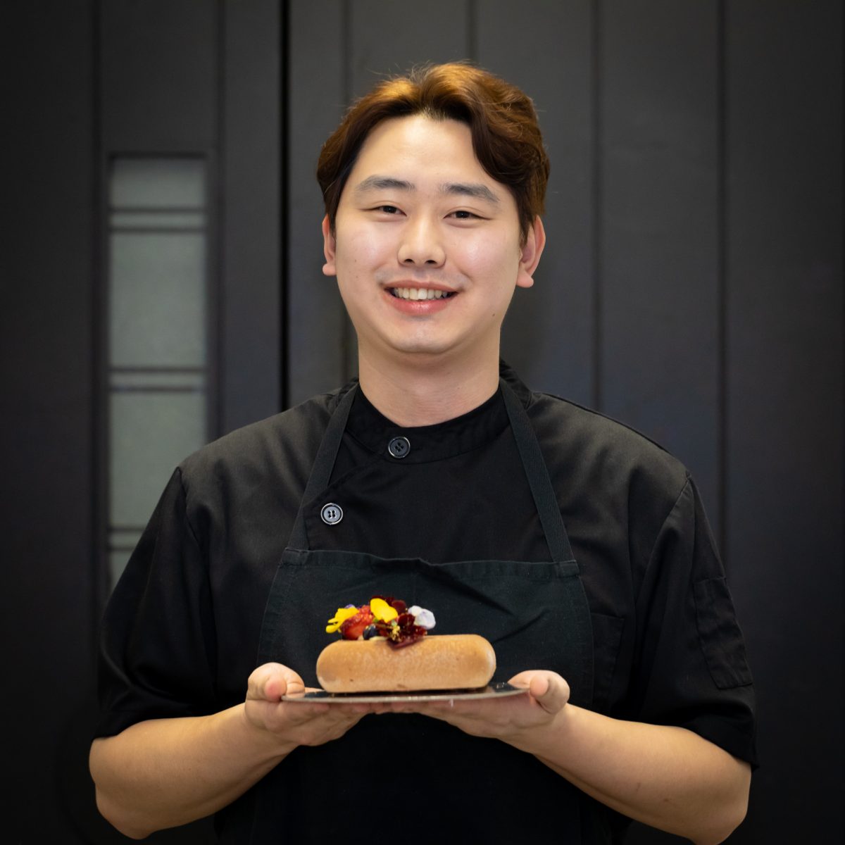 Chef holding food