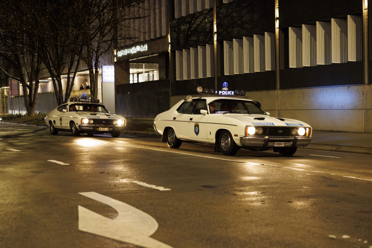 Two old Falcon police cars