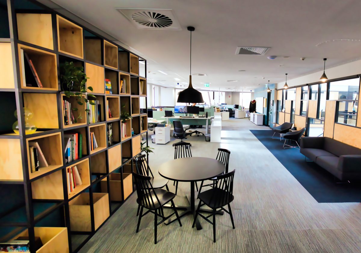 An office space with shelving, table, chairs and couches in Canberra's Centrepoint