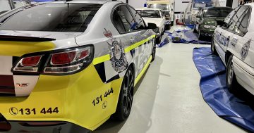 Inside the Hume shed where Canberra's historic police cars – and their stories – are preserved