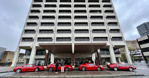 Help kids in need (and celebrate Ferrari's 75th birthday) by abseiling down Woden's tallest tower
