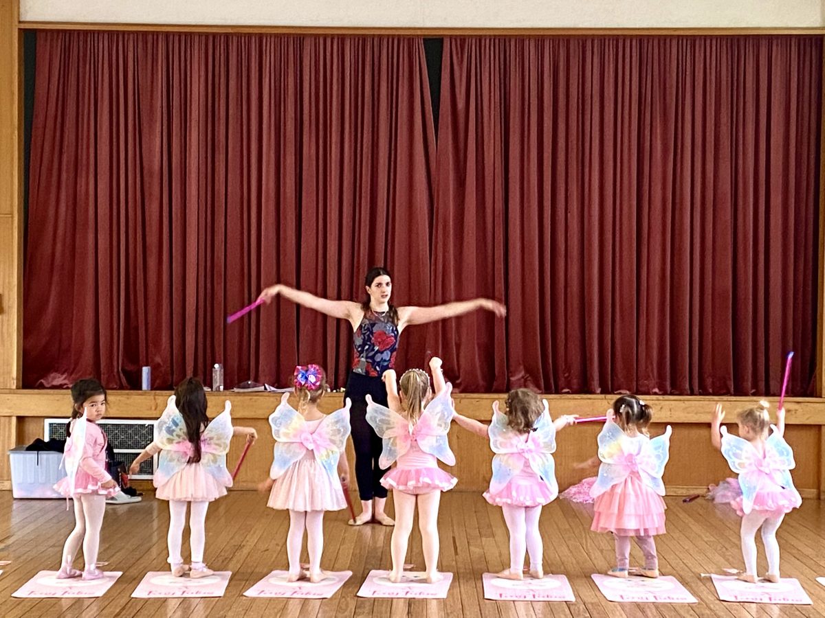 Poppy rehearsing with her dance class