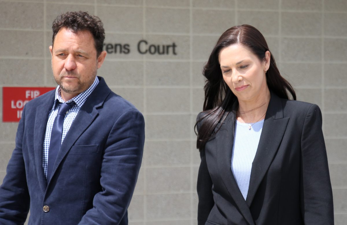 Man and woman leaving court