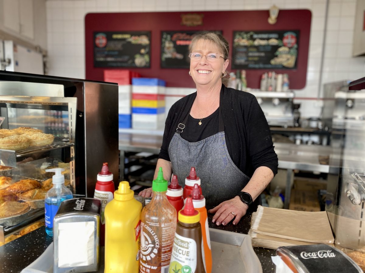 Woman in pie shop