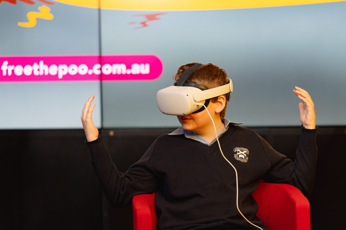 School child using a virtual reality headpiece at Questacon during Water Week