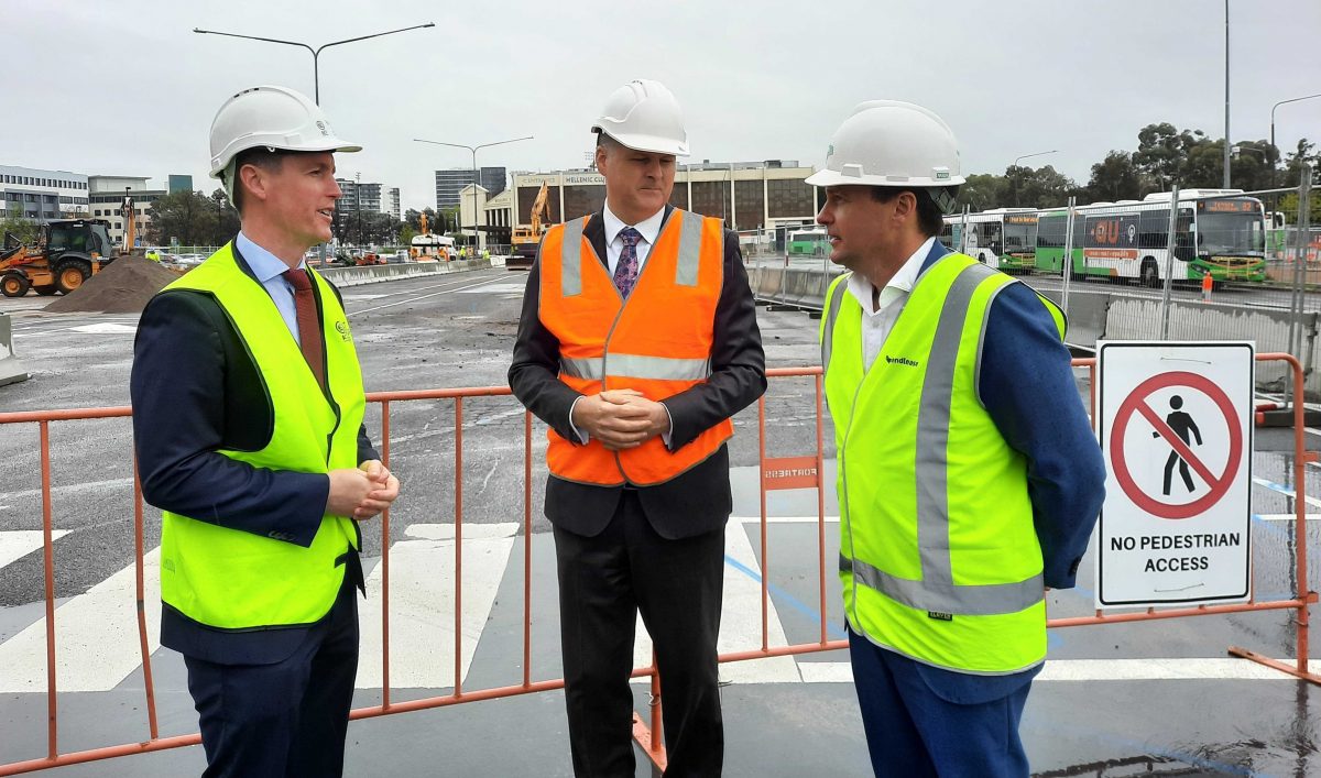 Three men in hard hats