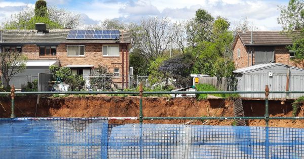 Safety blitz after development site excavation swallows backyards in Dickson