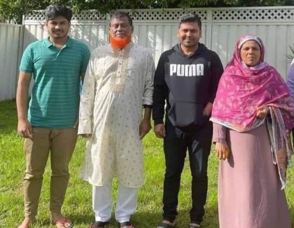 Family standing in garden