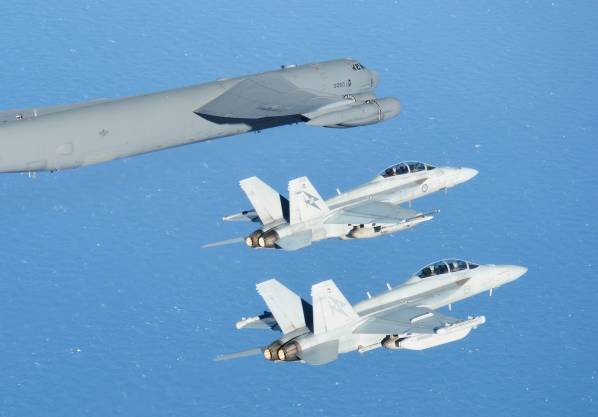 Three aircraft flying over water