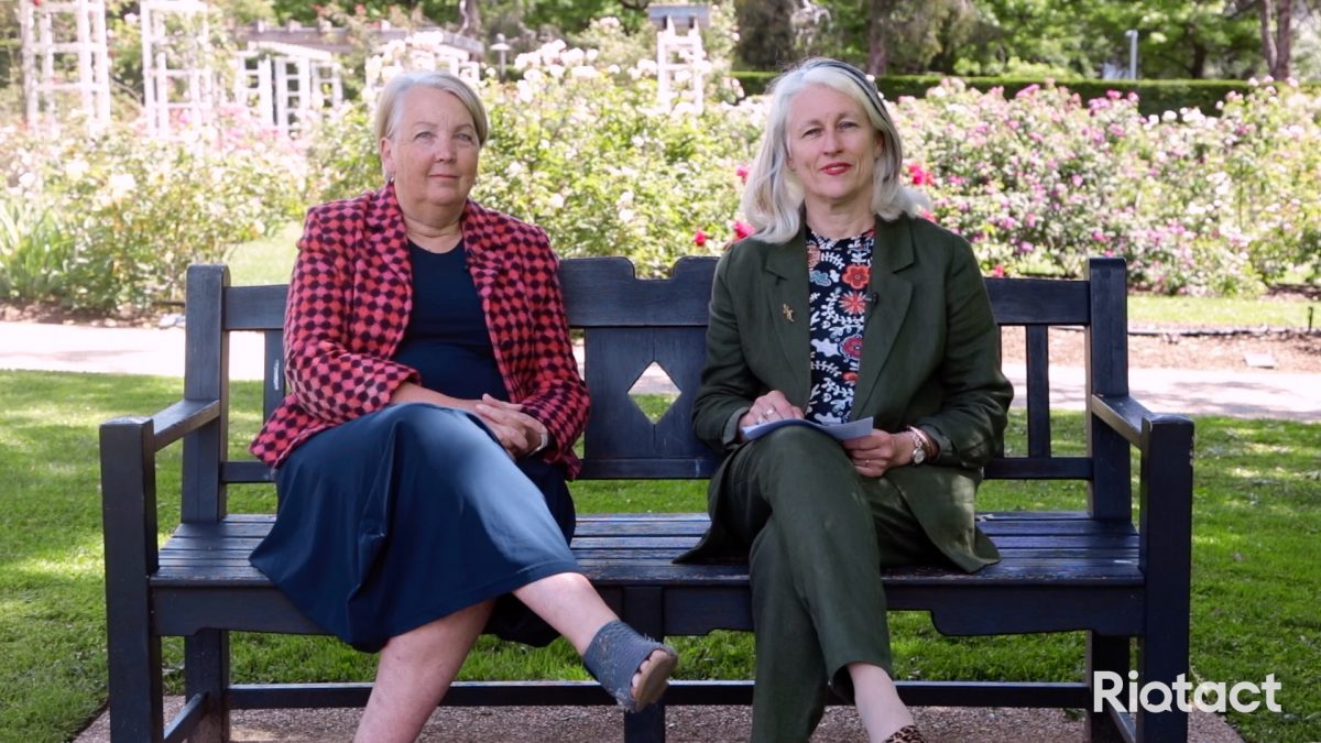 two women on garden bench