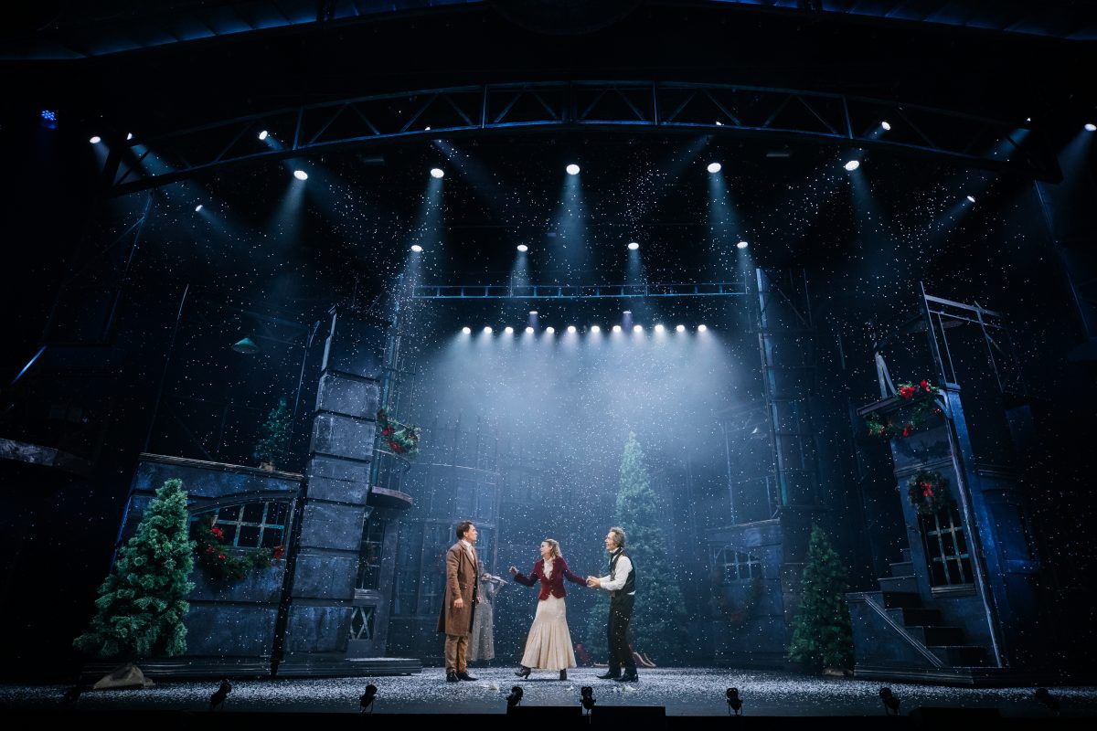 A Christmas Carol cast on stage