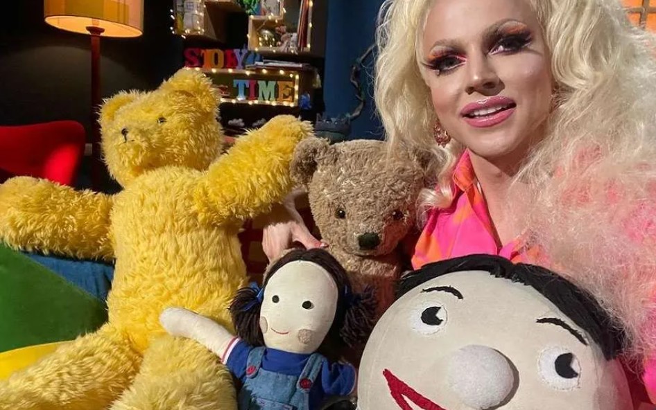 Drag queen with stuffed toys